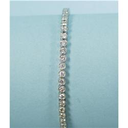 A platinum and diamond line bracelet designed as a sequence 