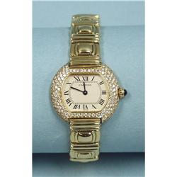 CARTIER - FRANCE. A ladies "Ellipse" 18 Kt. yellow gold and 