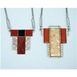 A lot comprising three Art Deco jewelry necklaces. One silve