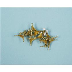 An 18 kt. yellow gold and diamond pin brooch by Cavelti, set