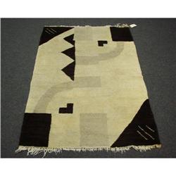 A French Art Deco wool carpet with geometric design in brown