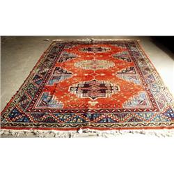 A semi-antique Turkish wool carpet. Approx. size: 8'9" x 13'