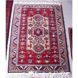 A Persian Ardebil wool rug. Approx. size: 5'1" x 3'6".