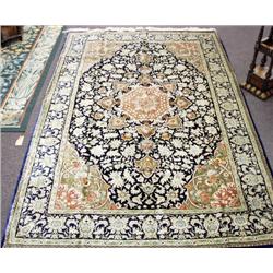 A semi-antique Persian Qum silk carpet. Approx. size: 10' x 