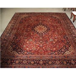 An antique Persian Keshan wool carpet. Approx. size: 10'6" x