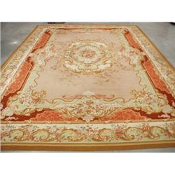 An Aubusson design wool carpet. Approx. size: 13'10" x 21'.