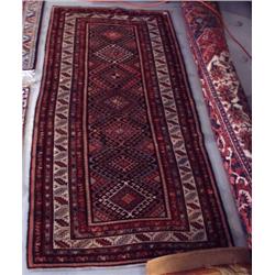 A Persian Hamadan wool runner. Approx. size: 7'9" x 3'8".