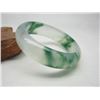 Image 2 : A NATURAL BURMA WAVE JADE BANGLE.