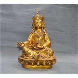 A GILT BRONZE GURU RINPOCHE BUDDHA FIGURE QING DYNASTY.
