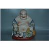 Image 1 : A PORCELAIN ENAMEL BUDDHA FIGURE QING DYNASTY 17TH/C.