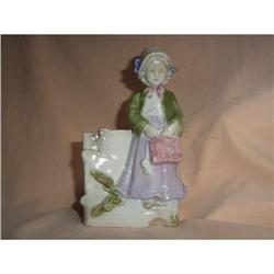 Porcelain figurine of a sweet little girl. #1495762