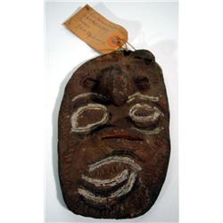 AN OLD YAUL CERAMIC MASK