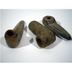 A COLLECTION OF THREE STONE PIPES