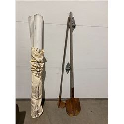 Shovel, hoe and plastic wrap