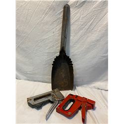 scoop shovel and 2 staple guns