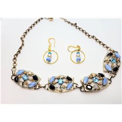 13)  GOLD TONE WITH OPAL, BLUE CAST'S EYE