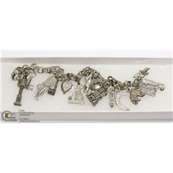 39G .925 STERLING CHARM BRACELET W CHARMS