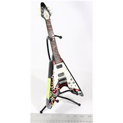 FLYING V GUITAR COIN BANK ON METAL GUITAR STAND