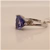 Image 3 : 31) PLATINUM TANZANITE AND DIAMOND RING