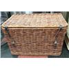 Image 1 : LARGE WICKER TRUNK LEATHER STRAPPED