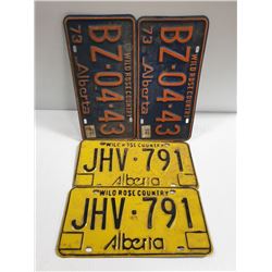 BOX WITH 2 SETS OF VINTAGE LICENSE PLATES