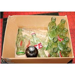 12 COLLECTIBLE SMALL COKE BOTTLES WITH