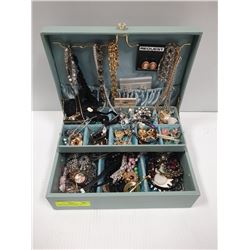 LARGE BLUE JEWELLERY BOX OF VINTAGE RHINESTONES