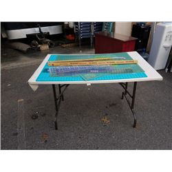 Folding table and drafting supplies