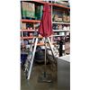 Image 1 : Cast iron umbrella stand and patio umbrella