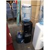 Image 1 : Black Primo top-load water cooler with two jugs