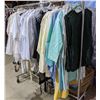 Image 1 : Large lot of clothing including scrubs, cooking outfits etc