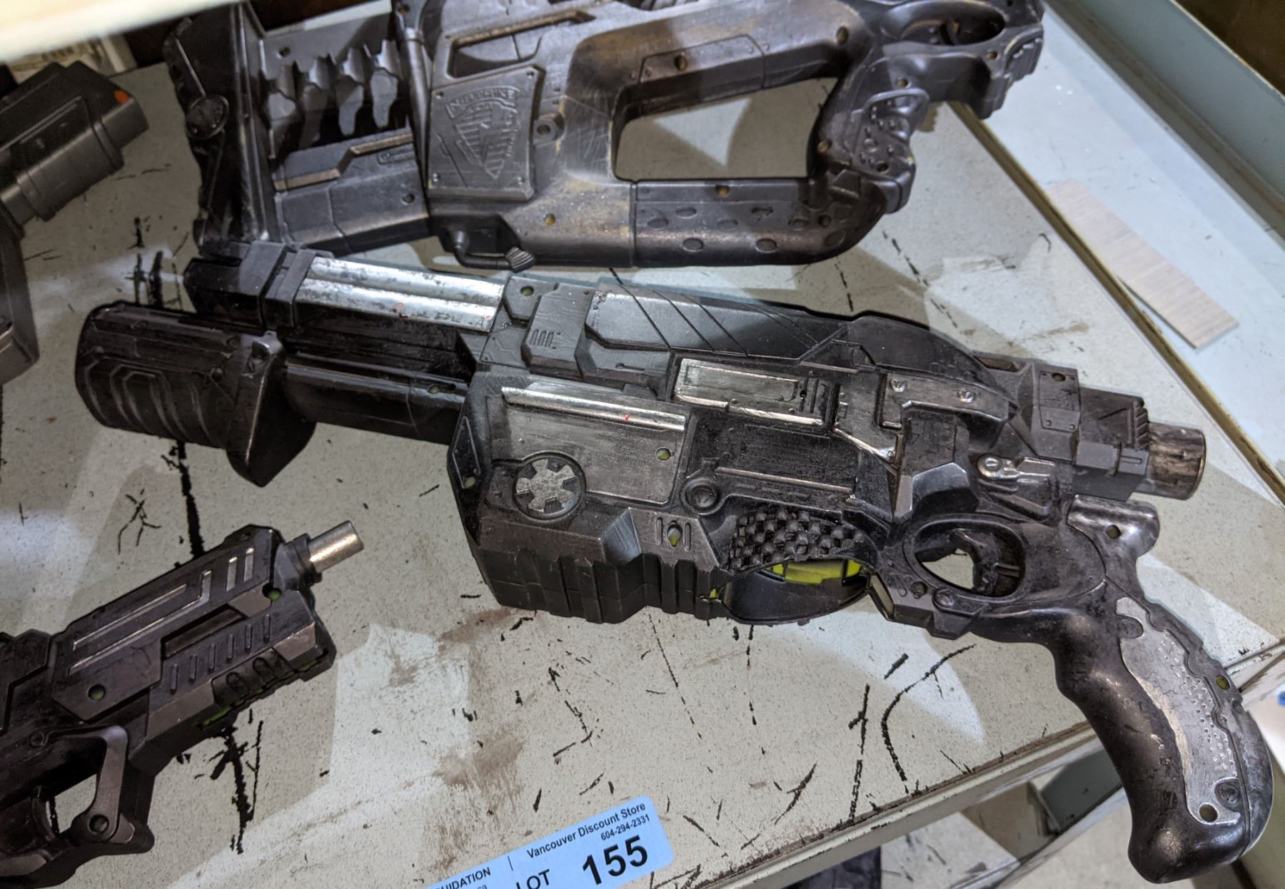 Large lot of prop guns from Sci-fi show