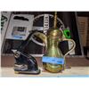 Image 2 : Office seal and a brass jug from Chilling Adventures(season 4)