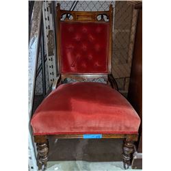 Red victorian chair from Chilling Adventures(season 4)