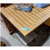 Image 2 : a teak bar table with metal base from the scifi show