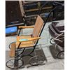 Image 2 : Wooden baby stroller from Chilling Adventures(season 4)