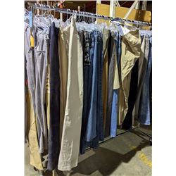 A rack of pants including jeans and cargo pants