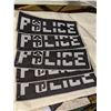 Image 1 : Half rack of gloves, boots and police tags