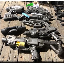 A lot of prop handguns from the sci-fi show