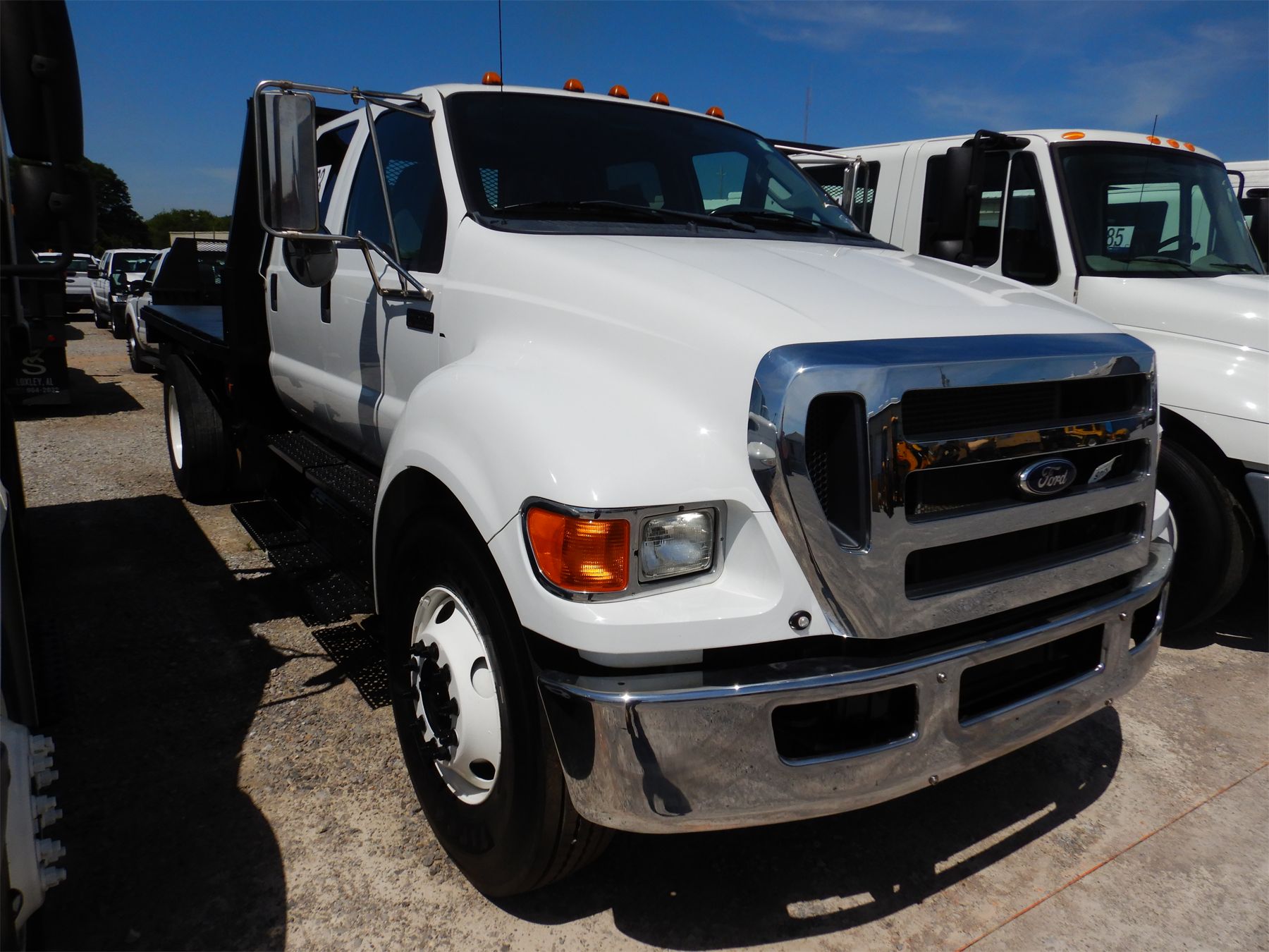2015 FORD F650 XL Flatbed Dump Truck J.M. Wood Auction Company, Inc.