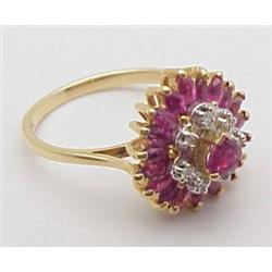 Lady's ring ruby baguette with small di
