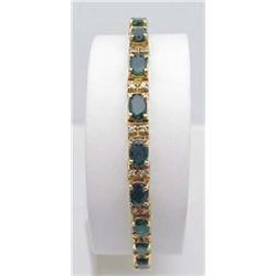 Lady's bracelet 11Ctw emeralds and .75C
