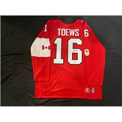 JONATHAN TOEWS FRAMEWORTH AUTOGRAPHED 2014 TEAM CANADA JERSEY WITH FRAMEWORTH C.O.A
