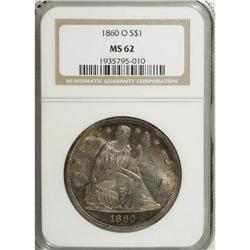 1860-O S$1 MS62 NGC. Tobacco-brown toning is deepest n