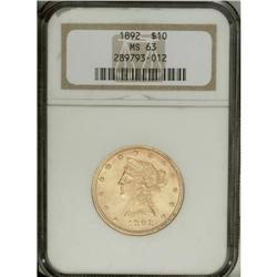 1892 $10 MS63 NGC. Frosty and lightly abraded with whe