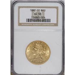 1892-CC $10 AU58 NGC. The intensely lustrous straw-gol