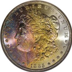 1885 S$1 MS67 S NGC. Much of the obverse is toned wit