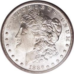 1886-O S$1 MS64 PCGS. Specks of gold toning are eviden