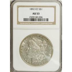1892-CC S$1 AU53 NGC. An affordable, lightly circulate