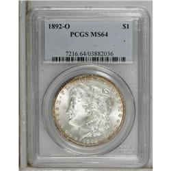 1892-O S$1 MS64 PCGS. Orange-gold freckles cling to th